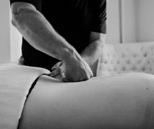 Focused forearm pressure during a back massage