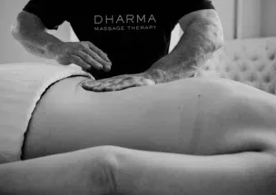 Focused forearm pressure during a back massage